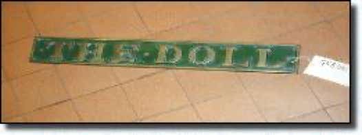"The Doll" nameplate